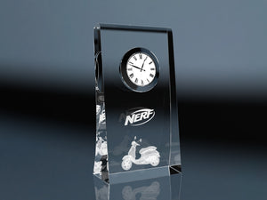 Crystal glass desk clock engraved with a logo and scooter, a premium corporate gift