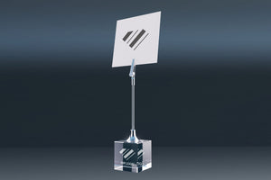 Elegant engraved crystal glass memo holder with wire clip against a dark background