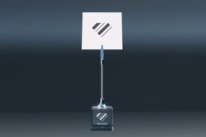 Elegant crystal glass memo holder with logo engraving, metal clip and note in a modern design