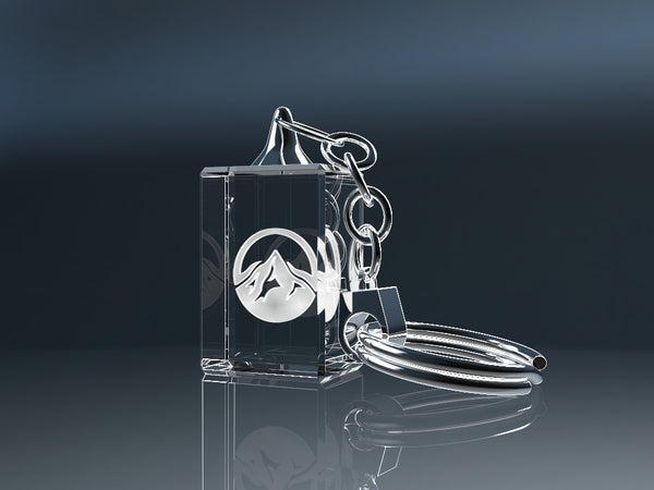 Premium glossy crystal glass keyring engraved with a mountain motif