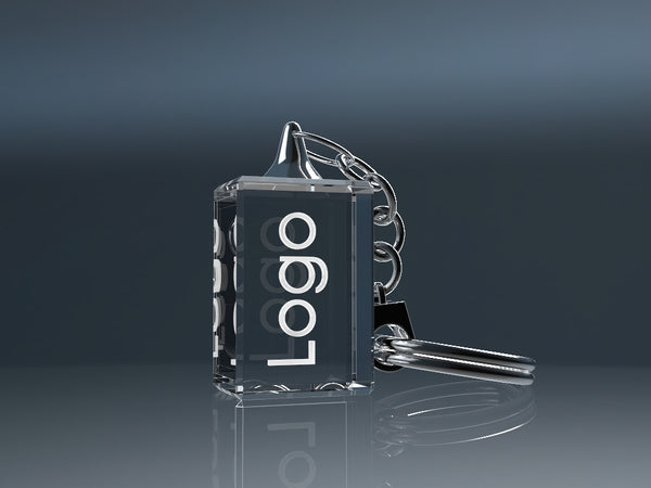 Rectangular crystal glass keyring with an engraved logo and metal chain