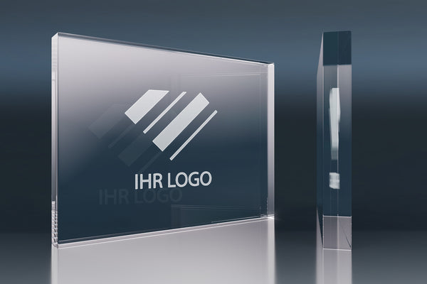 Rectangular crystal glass promotional item with an engraved logo on a glossy background