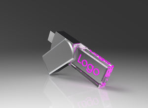 Crystal glass USB drive with a bright pink illuminated logo and USB-C connector on a grey background