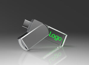 Metal and crystal glass USB-C drive with a green illuminated logo